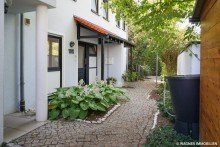 front view of the house Lovely Townhouse with Fitted Kitchen, Garden & Garage Close to Mainz City Center | WAGNER IMMOBILIEN